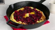 Dutch Baby Pancake with a Cranberry Maple Compote