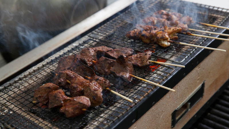 Llama Inn Chef Erik Ramirez Grills Peruvian Anticucho with Binchotan Charcoal 