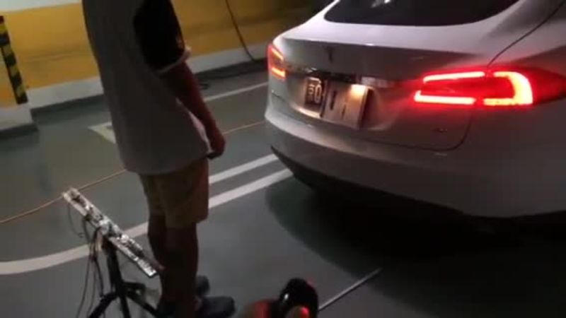 Ultrasonic jamming attack on a Tesla S