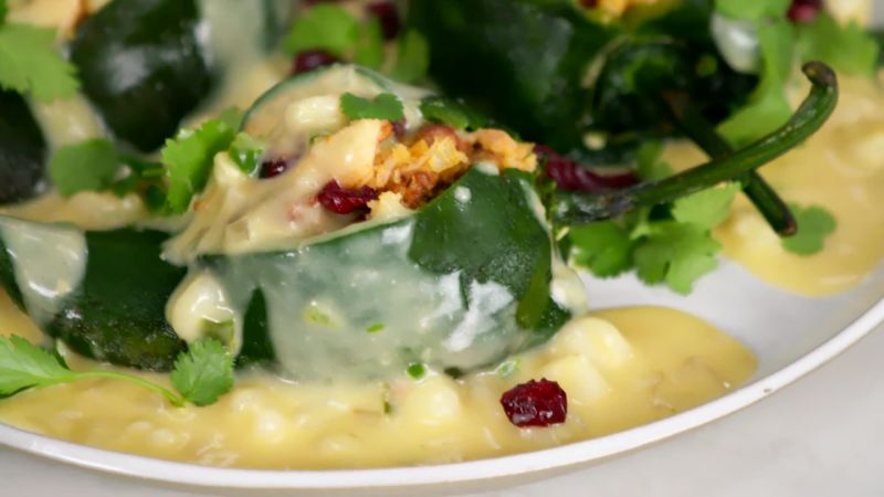 Turkey Stuffed Poblanos with Hominy Cream Sauce