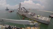 Watch a Heavy Lift Ship Pick Up a Navy Destroyer