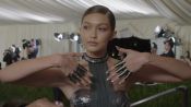 Gigi Hadid on Her Futuristic Bathing Suit and Chrome Knuckles at Met Gala 2016