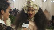 Cardi B on Her Kicking Baby and Pearl-Covered Dress 