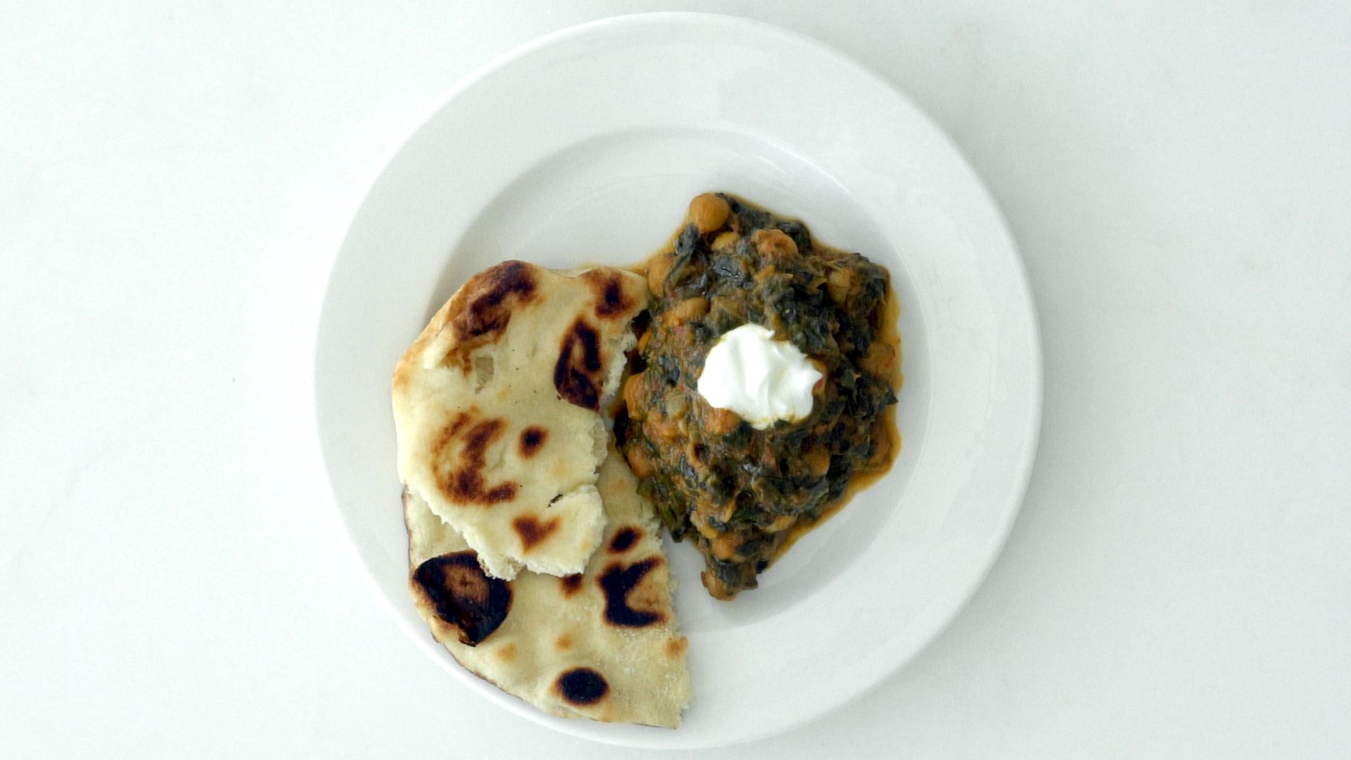 Watch How to Make IndianStyle Spinach and Chickpeas Bon Appétit