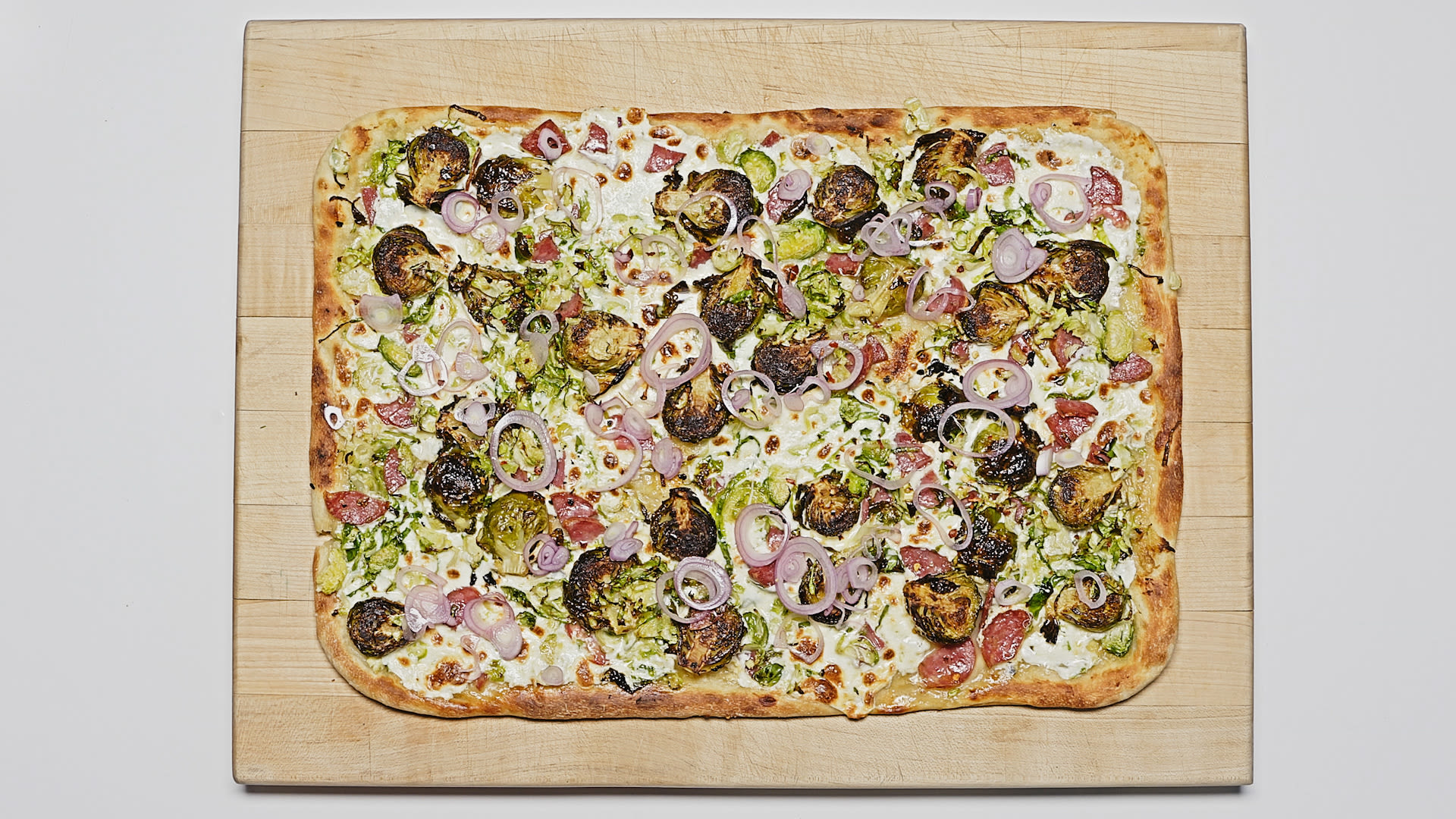 Watch Skillet Brussels Sprouts and Salami Pizza Bon Appétit
