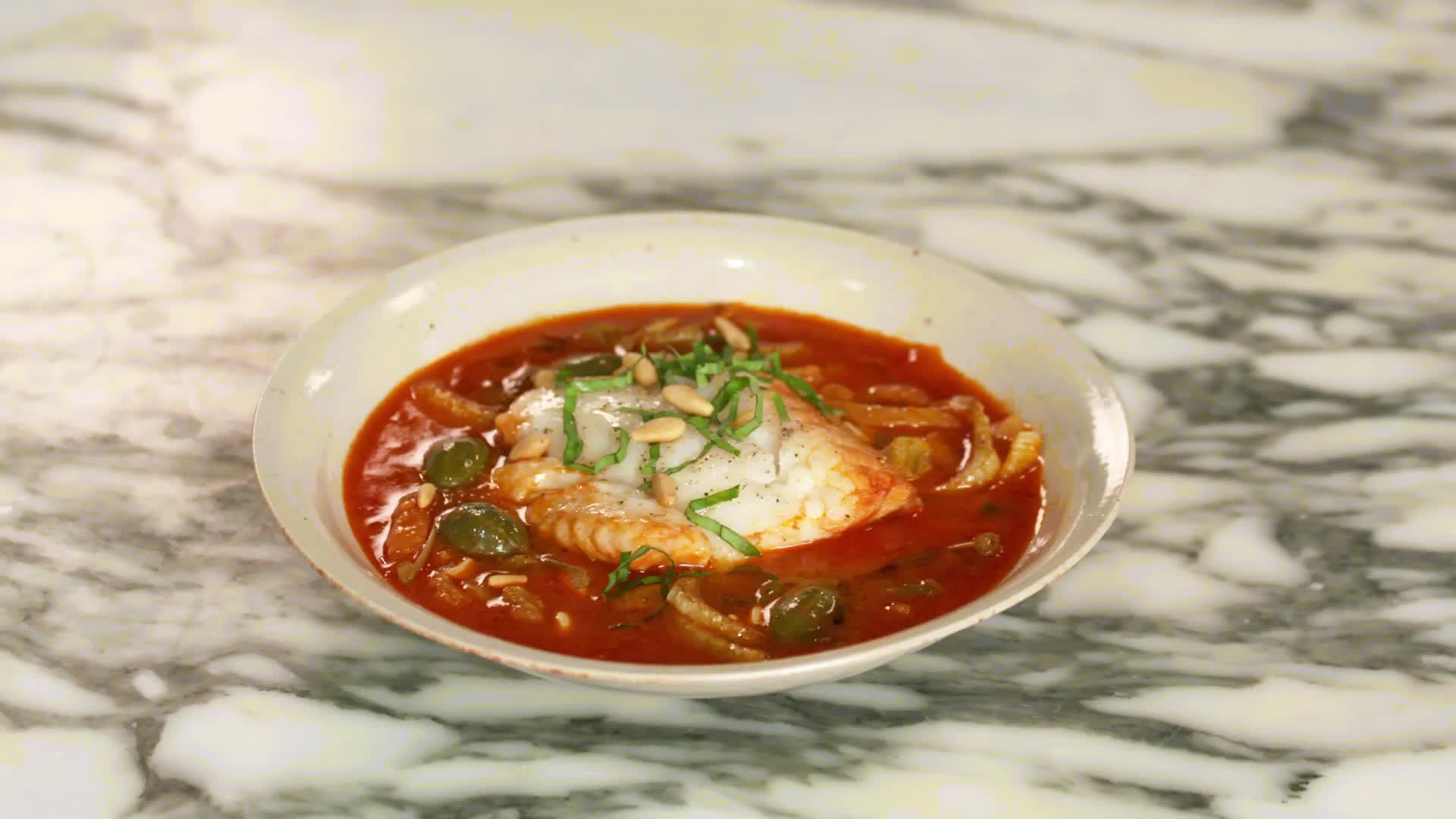 Watch SicilianStyle Braised Hake Bon Appétit
