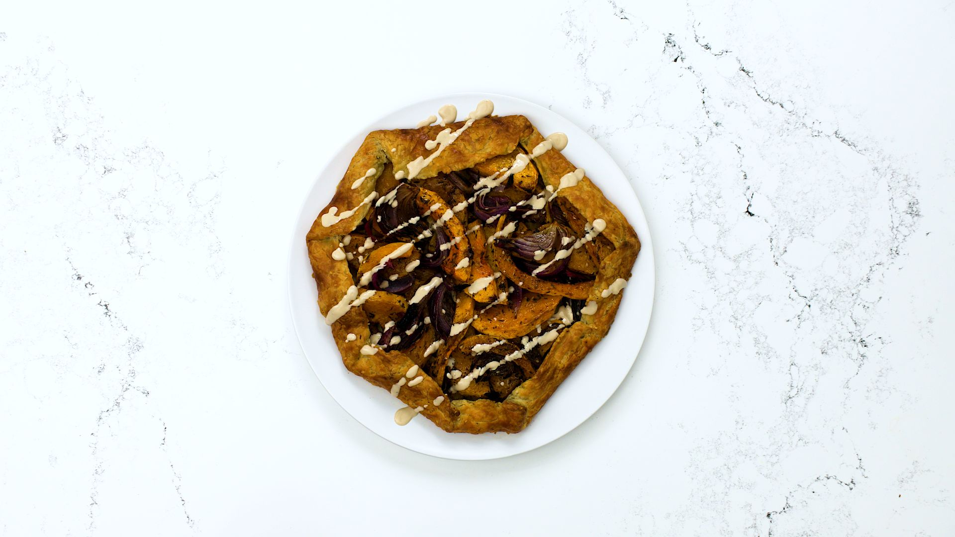 Watch Butternut Squash Tart with Tahini and Za’atar Bon Appétit