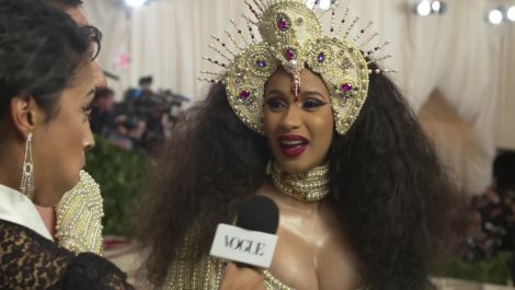 Cardi B on Her Kicking Baby and Pearl-Covered Dress 