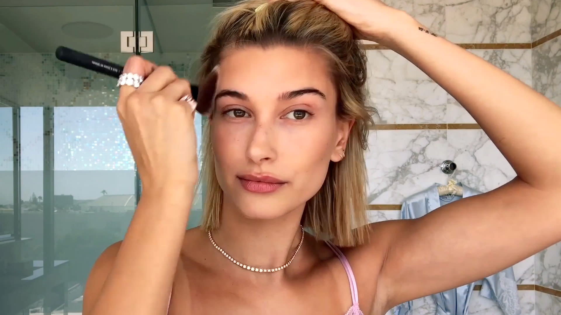 Kylie Jenner shared a makeup trick for a glowy, summer flush