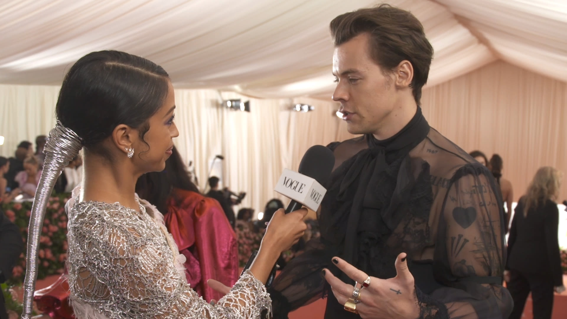 Watch Harry Styles on His Sheer Gucci Outfit and Being Met Gala Co ...
