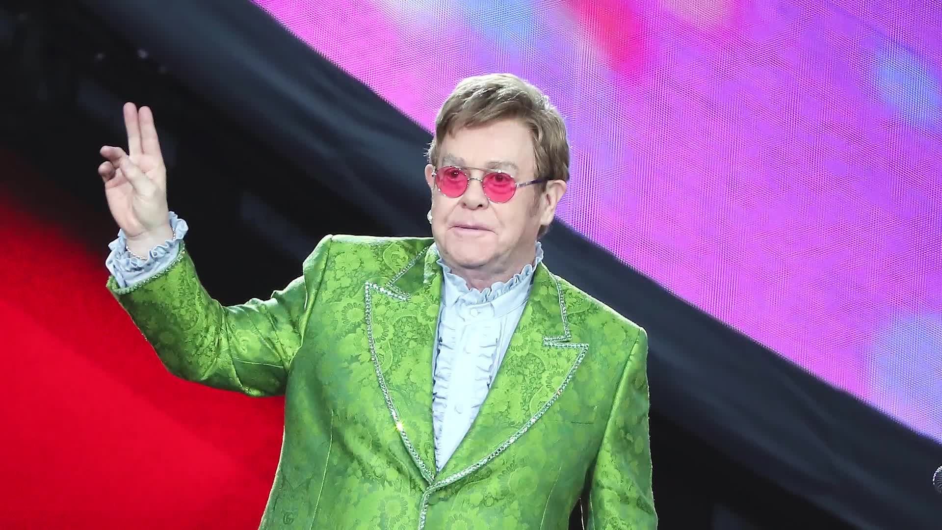 Watch Elton John's Life in Looks Proves He's Always Had a Flair