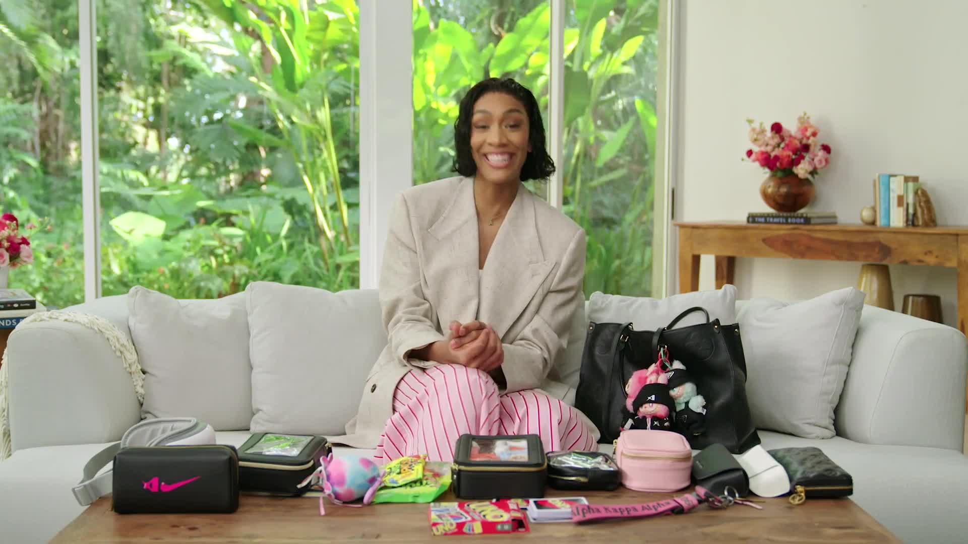 Watch A’ja Wilson’s Bag Is Full of Squishmallows, Sour Patch Kids, and ...