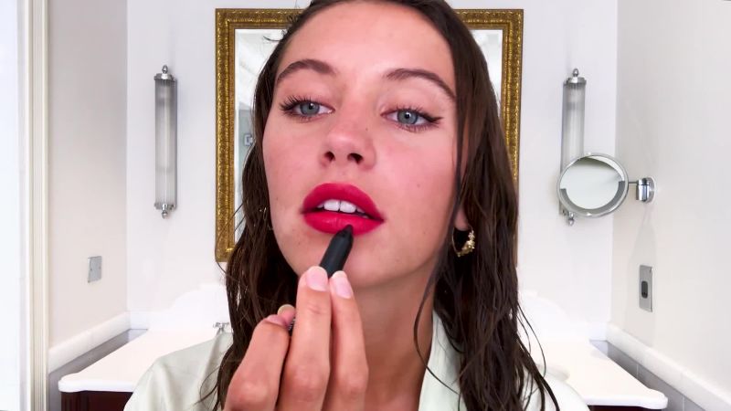 Iris Law On Beauty Marks Glowing Skin And The Art Of Red Lipstick Vogue